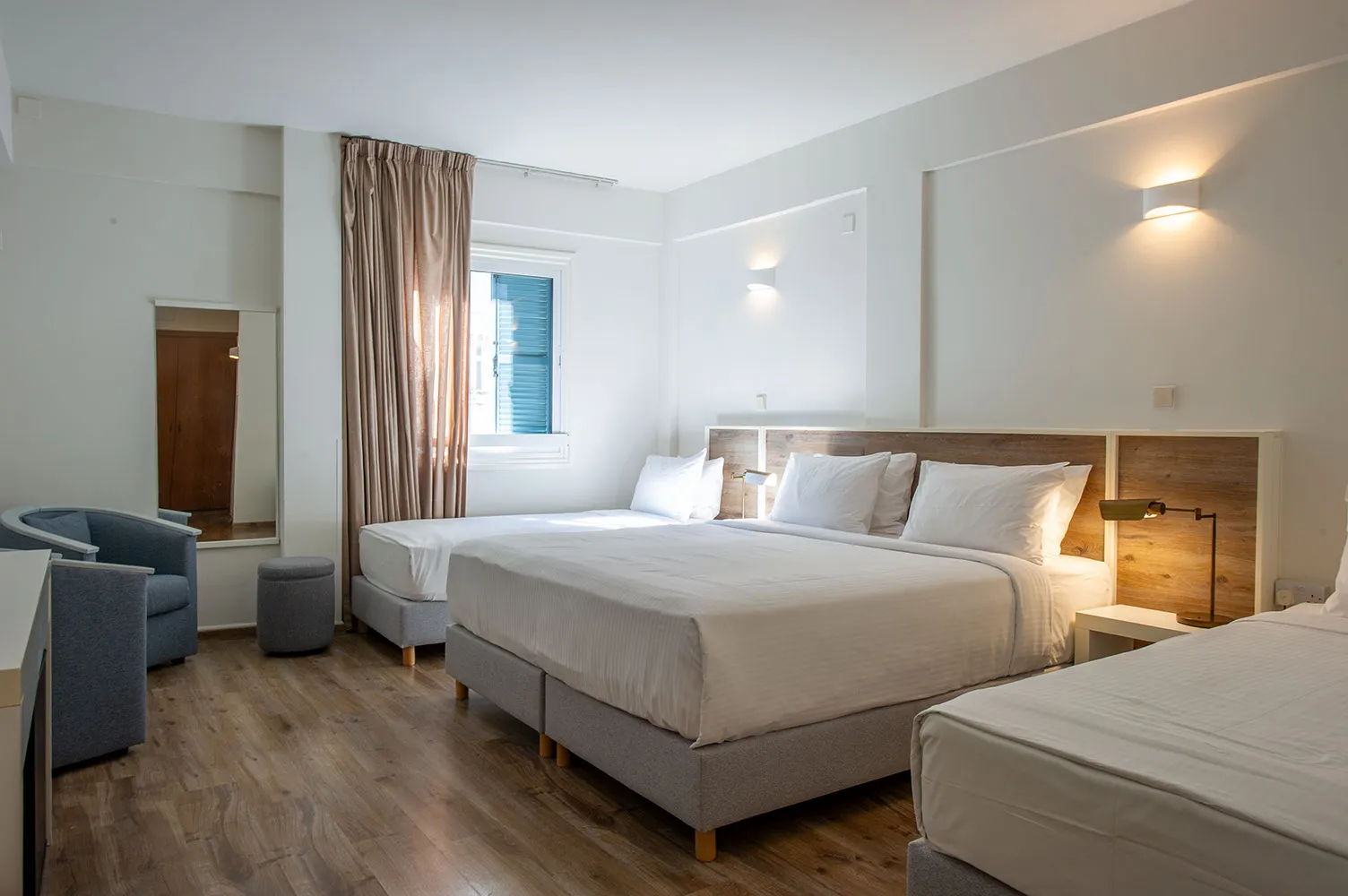 Twin beds and lounge chair