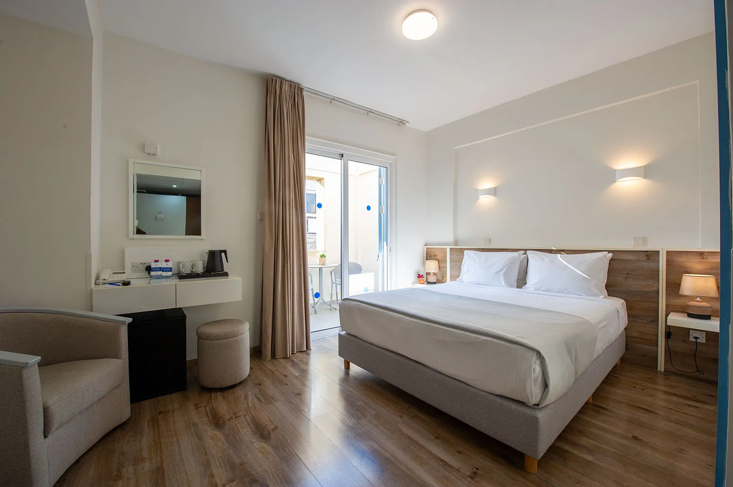 Bed with desk and blue shutters